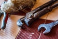 Closeup of an old, rusty plumbing wrench, wrench 22. Focus on co