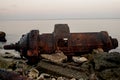 Closeup of an old rusty ship wreckage at a shore Royalty Free Stock Photo