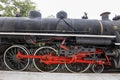 Closeup of old steam locomotive wheels Royalty Free Stock Photo