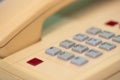 Closeup of old style wired desktop telephone - studio shot Royalty Free Stock Photo