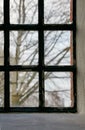 Closeup of an old window. Feeling trapped, scared, depressed and lonely during lockdown. Hiding inside at home Royalty Free Stock Photo