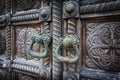 Closeup of old wooden door with vintage handle. Selective focus Royalty Free Stock Photo