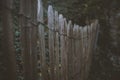 Closeup of an old wooden fence, shallow depth of field, vintage effect Royalty Free Stock Photo