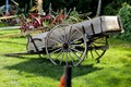 Closeup of an old wooden wagon wheel cart Royalty Free Stock Photo