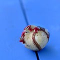 Closeup of Old Worn Ragged Baseball Torn Cover for Sport Royalty Free Stock Photo