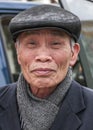 Closeup of older Vietnamese man.