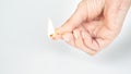 Older womans hand holding a burning matchstick Royalty Free Stock Photo