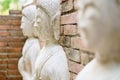 Buddha's disciples statue on the ruined brick pagoda