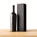 Closeup one not transparent gray glass bottle of wine on the wooden desk, white wall background.Empty glassy container