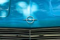 Closeup of the OPEL logo design / brand name on front grill of o