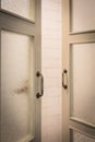 Closeup opened classic style wooden door