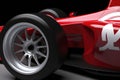 A closeup of an openwheel race car with its bright colors and white number 8 clearly visible next to its sponsor Speed Royalty Free Stock Photo