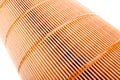 Closeup an orange paper car filter. Royalty Free Stock Photo