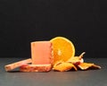 Closeup of orange-scented soap bars against a dark background Royalty Free Stock Photo