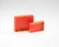 Closeup of orange-scented soap bars isolated on a white background Royalty Free Stock Photo