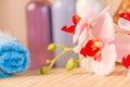 Closeup of orchid flowers and bottles of cosmetics Royalty Free Stock Photo