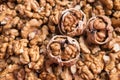 Organic Persian walnuts in cracked shells Royalty Free Stock Photo