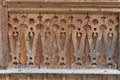 Closeup ornate wooden wood balcony railing craftsmanship