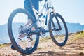 Closeup, outdoor and cyclist with fitness, bike and training for wellness, wheel and performance. Zoom, male person or