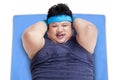 Closeup of overweight man working out Royalty Free Stock Photo