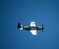 Closeup of P-51 Mustang WWII fighter plane in the sky Royalty Free Stock Photo