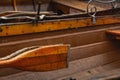 Closeup of a paddle attached to the wooden rowing boat Royalty Free Stock Photo