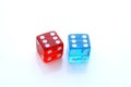 Closeup of a pair of color dices over white