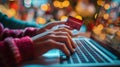 A closeup of a pair of hands typing quickly on a keyboard searching for the best Cyber Monday deals
