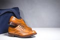 Closeup of Pair of Luxury Male Tanned Full Broggued Oxford Calf