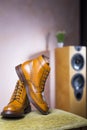 Closeup of Pair of Mens Tanned Semi-Brogue Boots on One Another