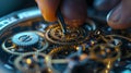 A closeup of a pair of steady hands attaching small gears and cogs to a watch face Royalty Free Stock Photo