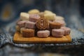 Closeup of pandan snow skin mooncakes served on a wooden serving board