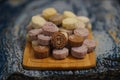 Closeup of pandan snow skin mooncakes served on a wooden serving board