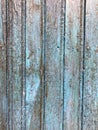 Closeup of panels of light blue, grungy wood door, Chefchauen, Morocco