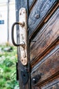 Closeup Age-old Wooden Door with Rusty Iron Handle Royalty Free Stock Photo