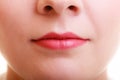 Closeup part of woman face red lips makeup detail. Royalty Free Stock Photo