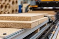 Closeup of particleboard sheets in workshop Royalty Free Stock Photo