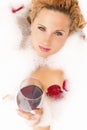 Closeup of Passionate Relaxing Sensual Caucasian Blond Female in Foamy Bathtub Royalty Free Stock Photo