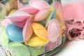 pastel flying saucers in a glass container