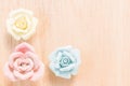 Closeup Pastel Rose on wooden background