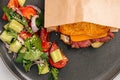 Closeup on pastrami sandwich with salad Royalty Free Stock Photo