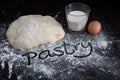 Closeup of pastry dough on baking board