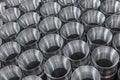 Closeup pattern of shiny circular steel metal part made on lathe. Metal industry products, workpieces. Steel products to