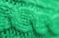 Closeup of the Pattern and Texture of Shamrock Green Knitted Wool Fabric