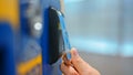 CloseUp of Paying by a Credit Card using PayPass Reader on a Vending Machine