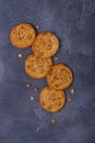 Closeup peanut cookies with scattered peanuts