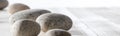 Pebbles for spirituality, ayurveda, mineral spa or mindfulness, long banner Royalty Free Stock Photo