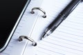 Pen, notebook and cell phone Royalty Free Stock Photo
