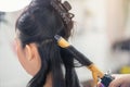 Closeup people hairdresser coiffeur makes hairstyle at haircut shop, Hair care in modern spa salon Royalty Free Stock Photo