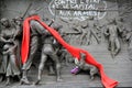 Closeup of the people's struggle, with red material wrapped around neck,Charlie Hebdo Memorial,Paris,France,2016